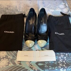 CHANEL Elegant Black Heels with Gold Accents